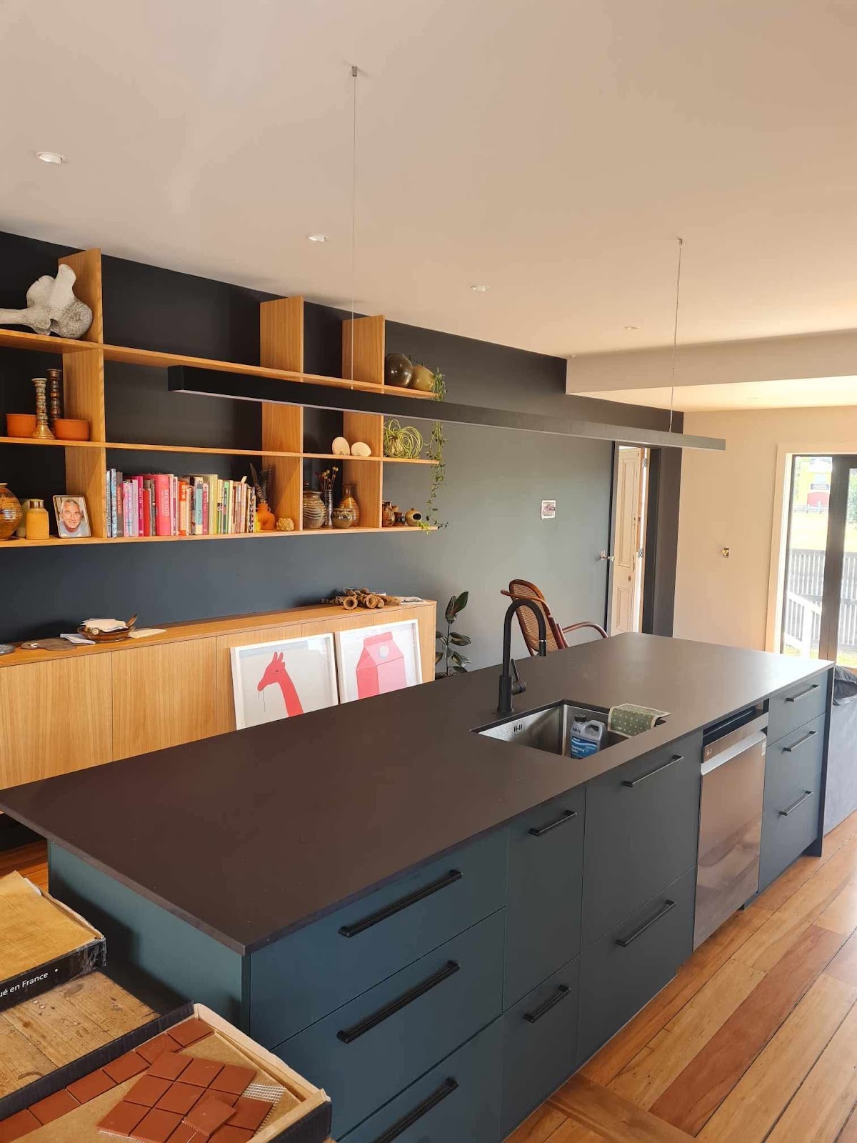 High end kitchen with suspended linear feature lighting installed by Limitless Electrical