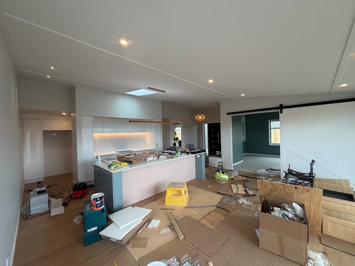 New build interior with downlights and pendants installed